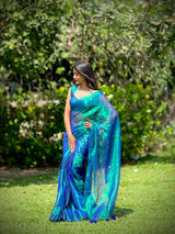 Premium Peacock Tissue Saree With Siquin Shine